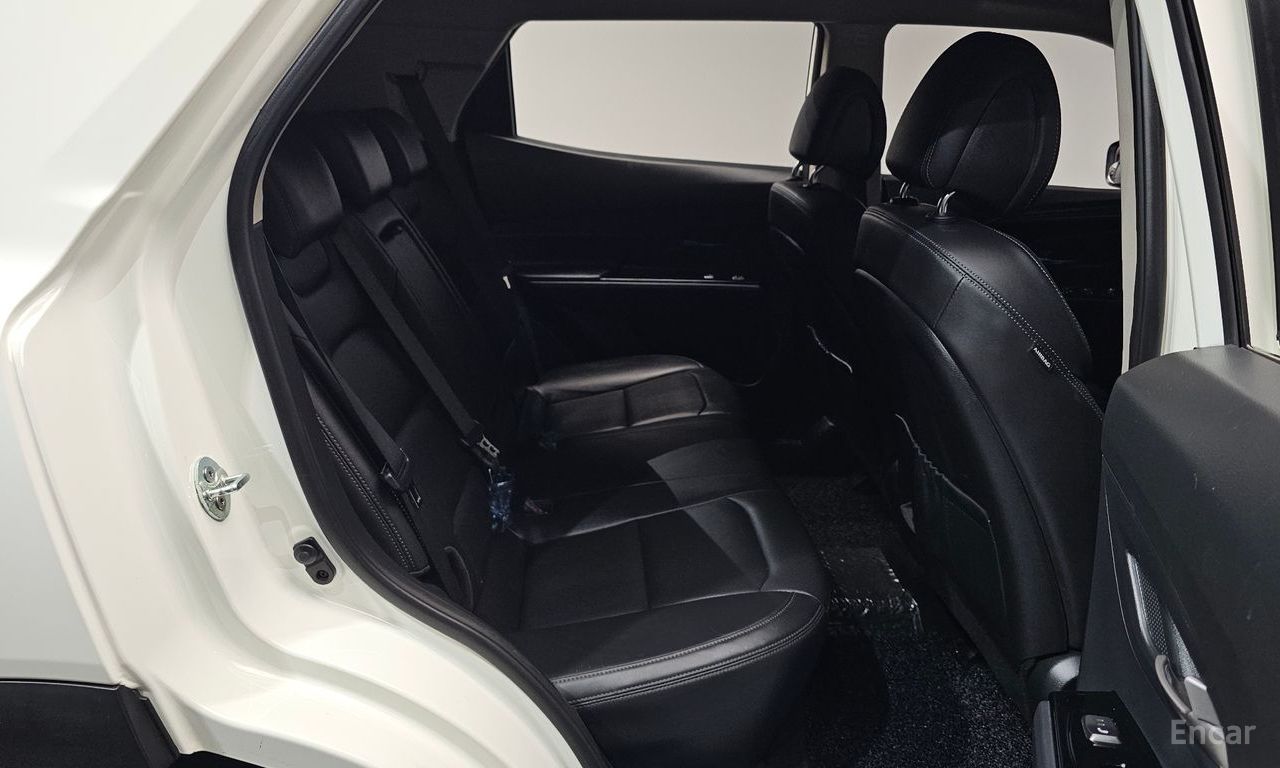 KG Mobility Korando Plus — Фотографии автомобиля 11
