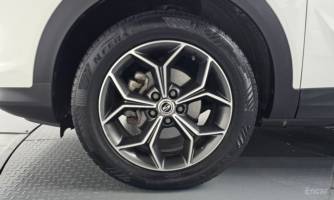 KG Mobility Korando Plus — Фотографии автомобиля 5